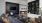 a spacious room with a media area