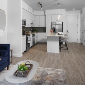 a living room with a blue couch