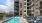 a swimming pool in front of a building