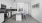 a kitchen with white cabinets