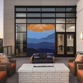 a modern looking building with a large glass front door